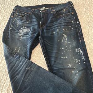 Mens True Religion World Tour Jeans size 38. Bleach spotted front and back.